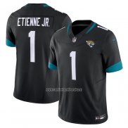 Camiseta NFL Limited Jacksonville Jaguars Travis Etienne Vapor F.U.S.E. Negro